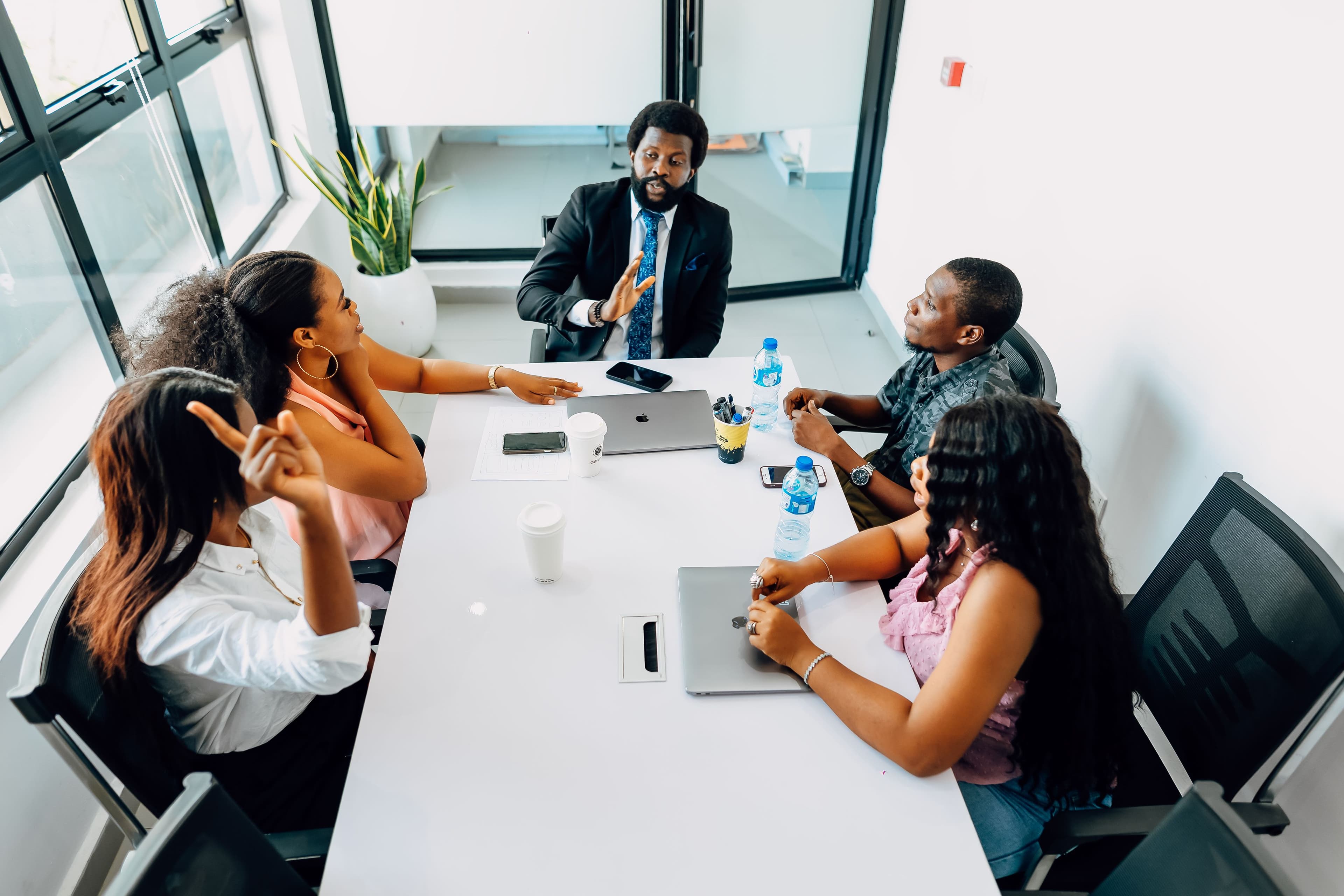 The Numero team in deep discussion in Lagos office
